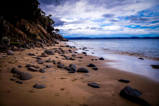 Beautiful pebble sand beach near Hobart, Tasmania, Australia