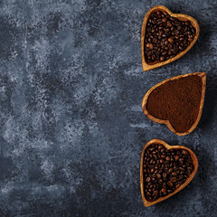 Top view of coffee beans, ground coffee and spices.