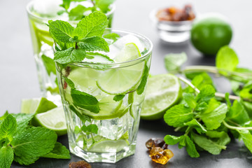 Mojito Cubano or caipirinha cocktail, iced drink with lime and mint