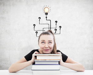 Fototapeta premium Woman with ponytail and books and light bulb maze