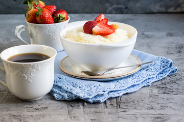 Milk rice porridge with strawberry