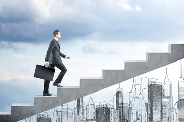 Man with suitcase climbing stairs in a cloudy day