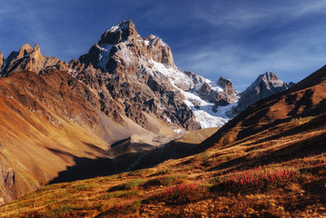 Fantastic scenery and snowy peaks in the first morning sunlight.