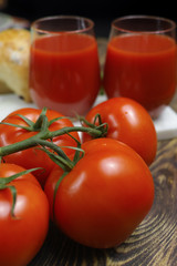 Raw Organic red Tomato Juice with salt, basil and bread
