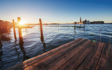 City landscape. Fantastic views of the gondola at sunset, moored