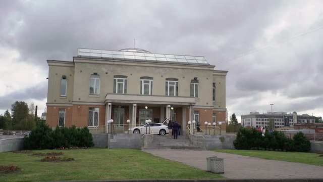 Wedding palace in Saint-Petersburg and wedding car shot