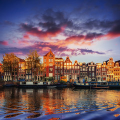 Obraz premium Amsterdam canal on the west. Capital and most densely populated 