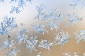 Frosty patterns on glass. Winter background.