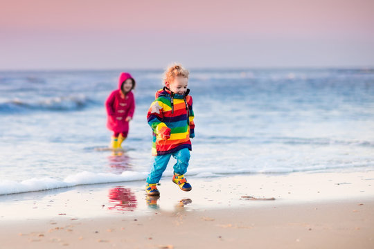 Kids on North Sea beach in winter