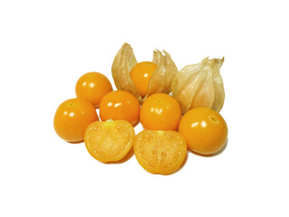 Bunch of vibrant yellow ripe Cape gooseberries, some with calyx, some cut in half isolated on white...