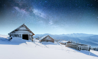 chalets in the mountains at night under the stars. Carpathians, 