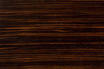 Dark ebony wood background, exclusive natural texture with patterns.