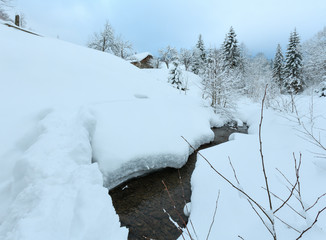 Brook in winter Carpathian Mountains.