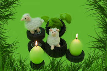 Easter decorations on green background.