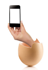 Hand with broken egg isolated on white backround