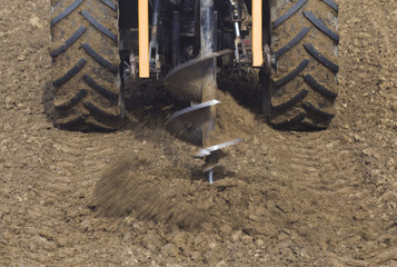 Drilling Hole with Tractor