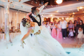 Happy bride and groom their first dance