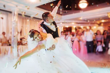 Deurstickers Happy bride and groom their first dance © standret