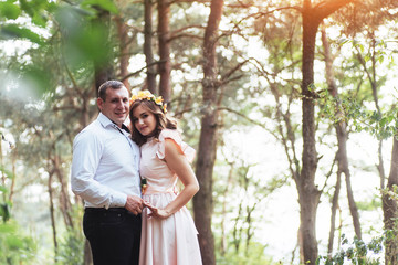 Walk a happy young couple on the nature