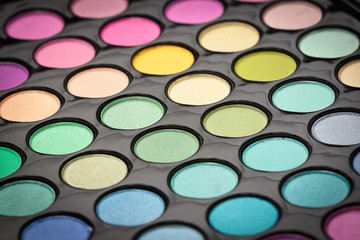 Make-up eye shadows background. Shallow DOF