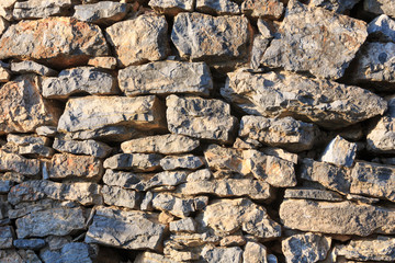 Old stone wall (background).