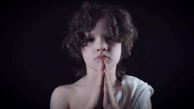 4k Religious Portrait of Young Jesus Praying
