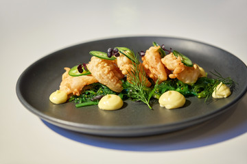 close up of prawn salad with jalapeno and wakame