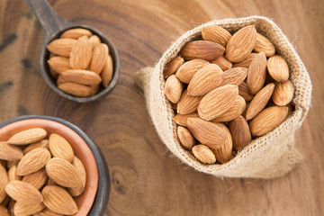Almonds on the wooden background