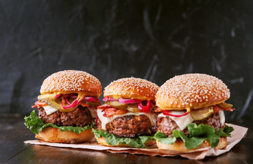 a delicious and juicy burger home in a rustic style with a big chop of beef