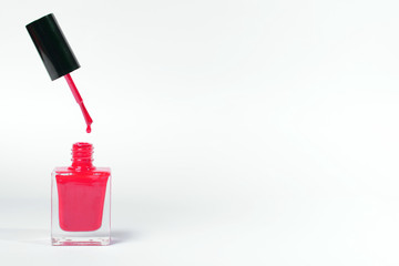 Fototapeta premium nail polish bottle on white background with space for your text