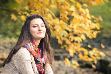 Portrait of a girl in autumn Park
