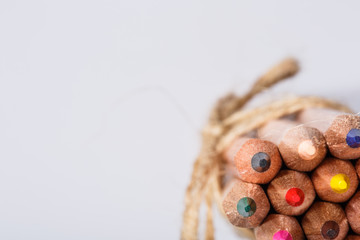bunch of pencils stylized decirative rope on white background