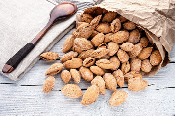 handful of almonds close up on linen material
