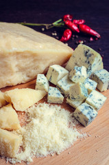 Grated Parmesan and sliced Blue cheese