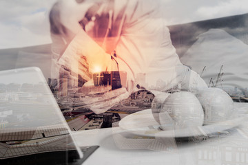 Fototapeta premium hipster hand using smart phone for mobile payments online business,sitting on sofa in living room,holding green apple in wooden tray