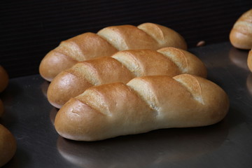 Fresh fragrant bread on the table. Food concept