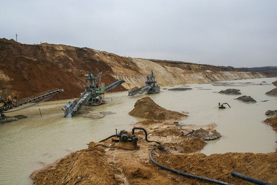 Clay quarry near the town of Pology in the Zaporizhya region of Ukraine flooded heavy rains. Equipment for mining of refractory clay - excavator rotary electric. March 2006