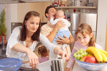 Family In The Kitchen