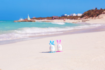 Fototapeta na wymiar Easter, Easter eggs on the beach, ocean, sea