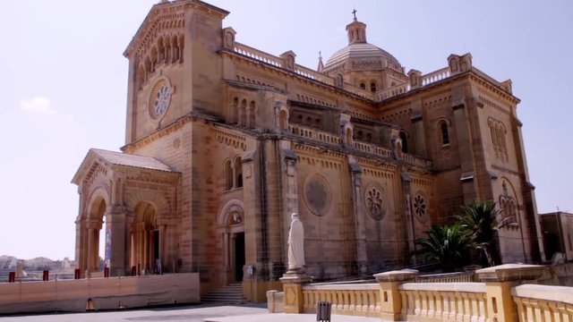 Basilica of the National Shrine of the Blessed Virgin of Ta' Pinu and Maltiese landscape