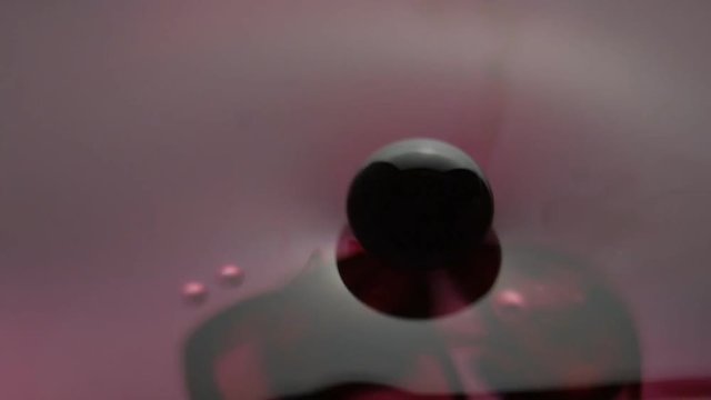 Close up macro of drop of blood is dropped into the water