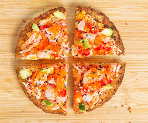 Deep-fried Japanese pizza sushi on wooden background © DD Images