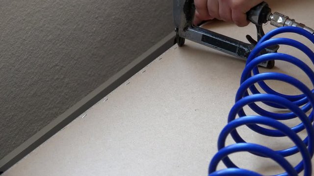Using staple gun to fix 
