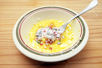 Colorful candied fruit with flour and eggs.