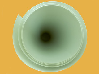 Deep circle paper roll texture isolated on yellow background