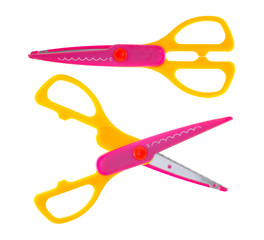 Colorful zig zag scissors in open and close isolated on white background