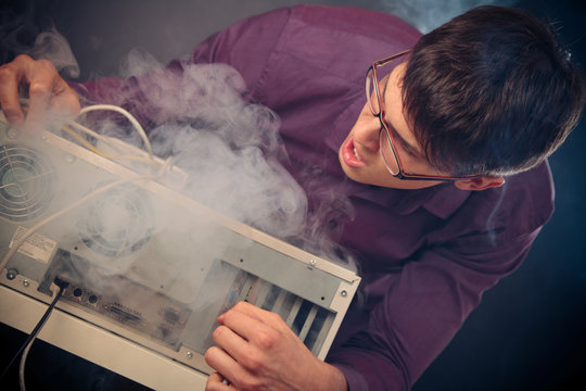 Nerd With Smoke Coming Out Of His Pc