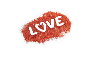 red glittering powder with text LOVE isolated on white background. Love concept.