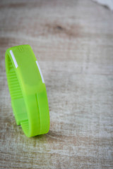 fitness bracelet on a wooden background. sport. fitness.