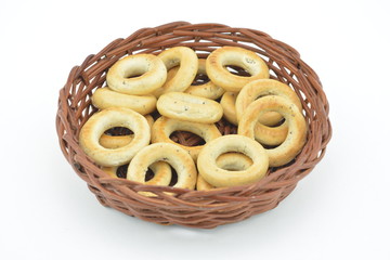 Several bagels in basket. Isolated bagels